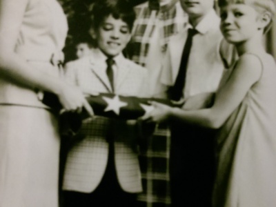 Sandy Moppert and myself, Jerry and students with Lt Moppert flag